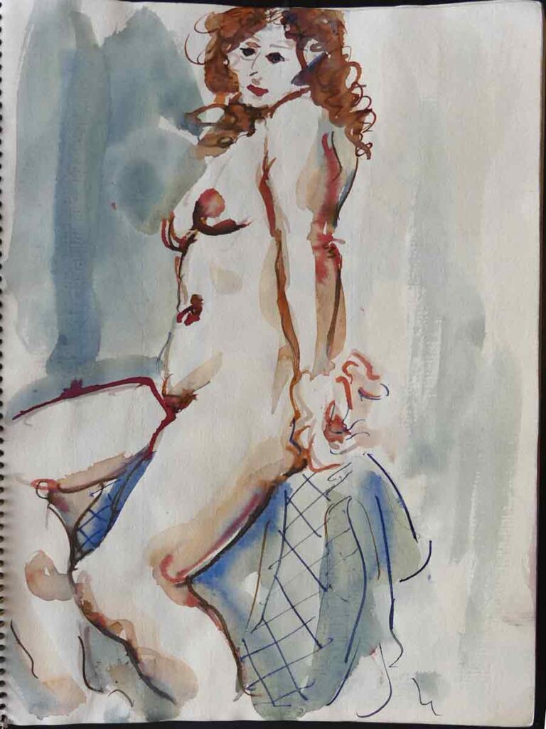 cuaderno de bocetos desnudo de mujer sentada